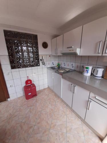 Η κουζίνα ή μικρή κουζίνα στο Apartmani Antonella
