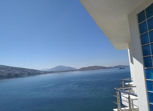 a view of the water from a building at Titania Hotel in Sarandë