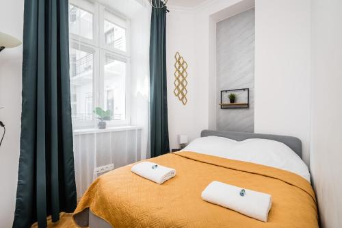 Ліжко або ліжка в номері Royal City Apartments Old Town