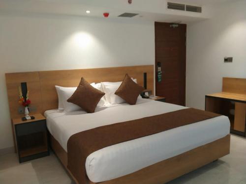 Krevet ili kreveti u jedinici u okviru objekta Hotel X Narsingdi