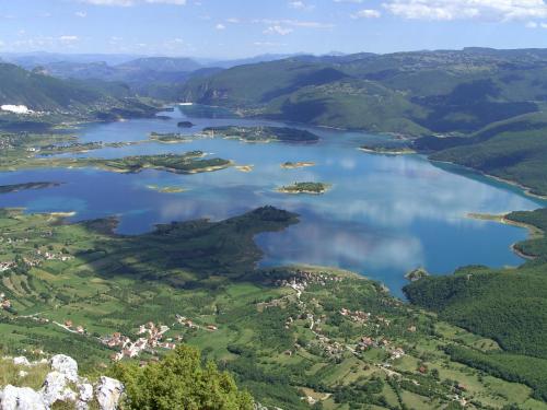 an aerial view of a lake in a valley at Apartman KONAK in Prozor