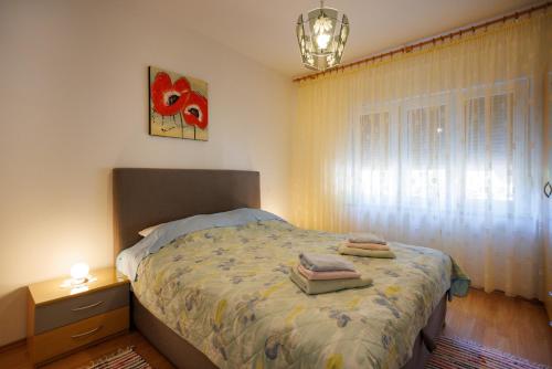 Posteľ alebo postele v izbe v ubytovaní Apartment studio close to sea