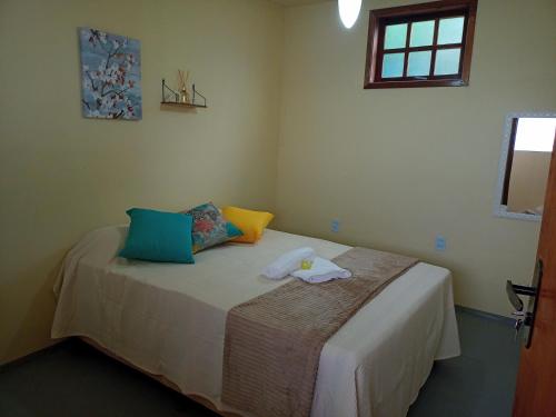 מיטה או מיטות בחדר ב-Hostel Guaratiba Casa do Café