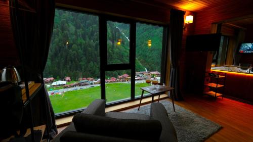 TV o dispositivi per l'intrattenimento presso Ayder Villa de Pelit Hotel