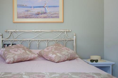 Ліжко або ліжка в номері Naiades Villas