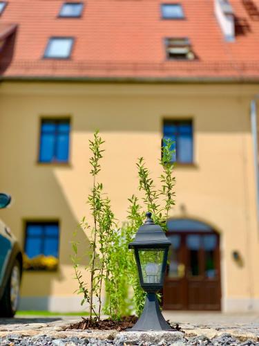 a street light in front of a house at APARTAMENT PIĘTROWY w centrum Kłodzka z darmowym parkingiem no 8 in Kłodzko