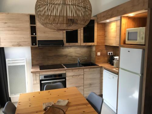 Photo de la galerie de l'établissement Appartement Royal Milan à deux clés partie nuit et partie jour, à Saint-Lary-Soulan