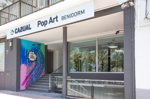 a building with a sign for a pop art aquarium at Casual Pop Art Benidorm in Benidorm