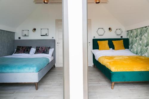 מיטה או מיטות בחדר ב-Flow House&Garden