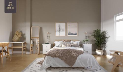 Un pat sau paturi într-o cameră la Hidden Hue Homestay