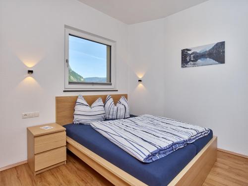 Un pat sau paturi într-o cameră la Apartment Isabella
