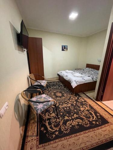 Postel nebo postele na pokoji v ubytování Hotel Maria