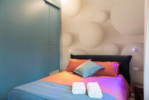 Postel nebo postele na pokoji v ubytování Pescara Blu B&B