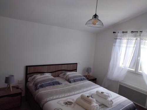 Posteľ alebo postele v izbe v ubytovaní Villa calme et tranquillité