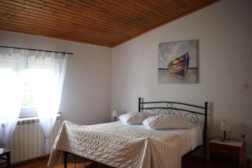 Posteľ alebo postele v izbe v ubytovaní Matanovi dvori-Krka National Park