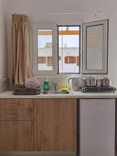 Una cocina o zona de cocina en Villa Konstantinos
