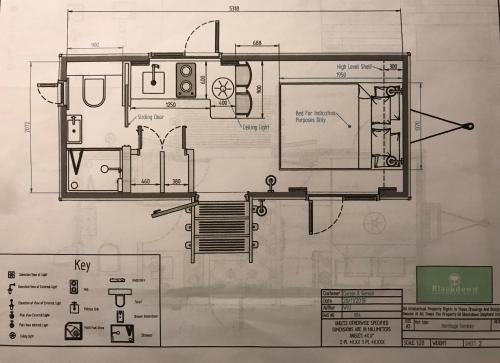 a drawing of a bathroom with a floor plan at The Dordogne Huts with Pool and Jacuzzi in Payzac