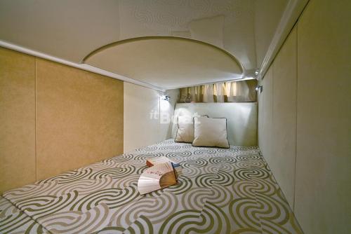 Ένα ή περισσότερα κρεβάτια σε δωμάτιο στο Daily Cruises Private Yachts