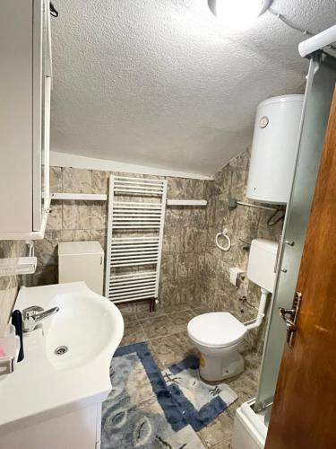 a bathroom with a sink and a toilet at Neretva View in Počitelj