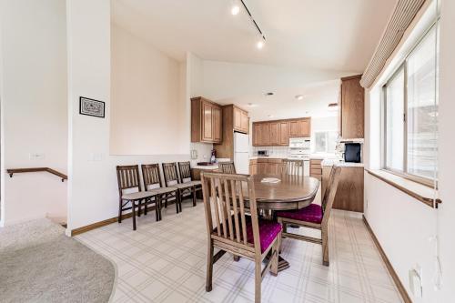 a kitchen and dining room with a table and chairs at Lost Coast Hideaway in Shelter Cove