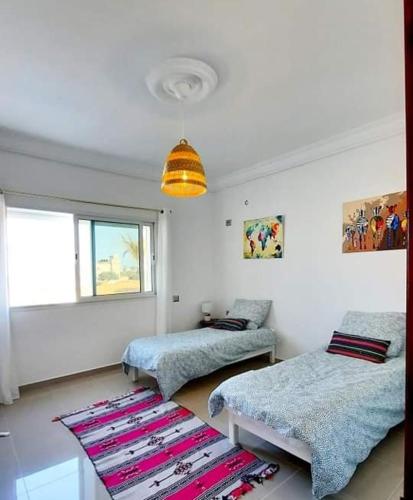 Katil atau katil-katil dalam bilik di Villa Morjène Djerba