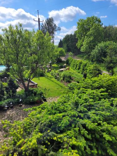 a garden with a view of the ocean at Dziewanna in Brzeziniec