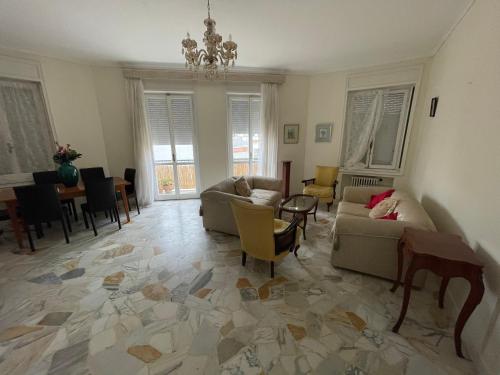 a living room with a couch and a table at Lovely apartment in the heart of Tangier in Tangier