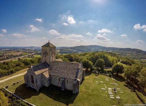 an aerial view of an old building on a field at Studio au bord de l'étang in Laives
