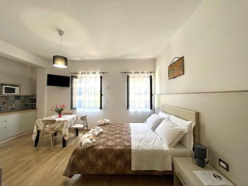 Televízia a/alebo spoločenská miestnosť v ubytovaní Bellavista Rooms