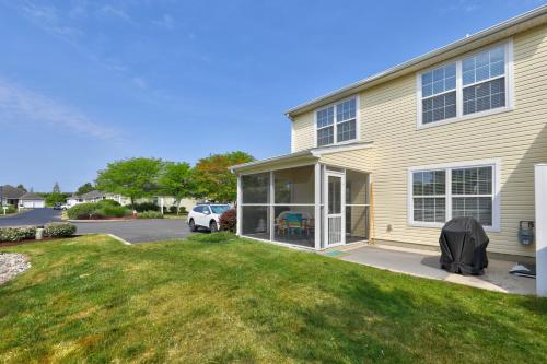 a house with a car parked in front of it at Keys of Marsh Harbor Truman Ct in Rehoboth Beach