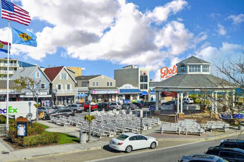 a town with cars parked in a parking lot at Town of Rehoboth Beach 24 Rehoboth Ave in Rehoboth Beach
