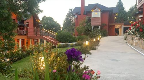 Κήπος έξω από το Costa Brava Apart Hotel & Suites