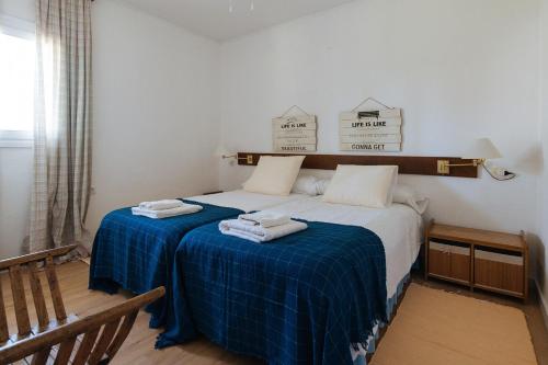 Ліжко або ліжка в номері La casita de Hato Pinos, un rincón en Doñana