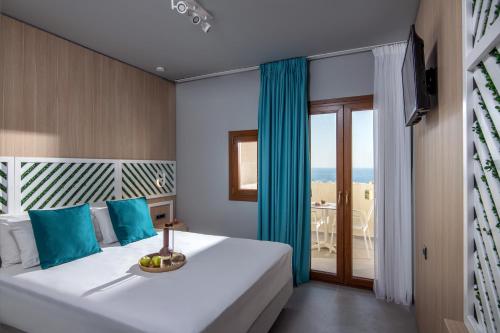 Ένα ή περισσότερα κρεβάτια σε δωμάτιο στο Villa Elite "by Checkin" Adults Only