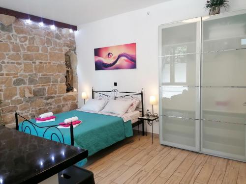 Ένα ή περισσότερα κρεβάτια σε δωμάτιο στο Apartment Central 1
