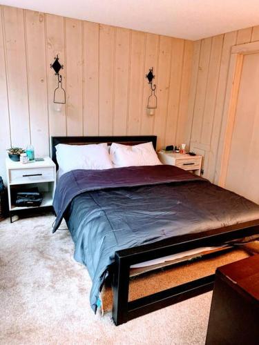 a bedroom with a large bed in a room at 4BD 2BA - Mount Snow VT - Ski-Back Trail - Shuttle in Dover