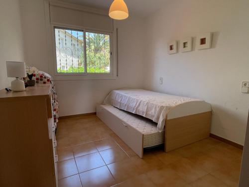 A bed or beds in a room at Myhost la Dorada frente al mar