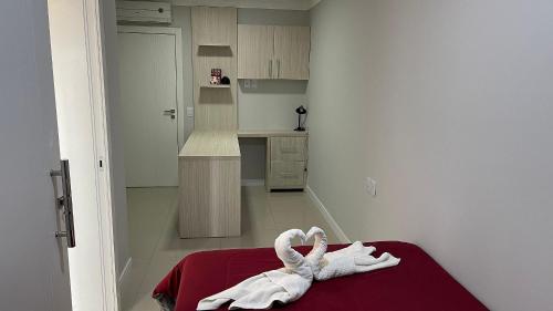 Кровать или кровати в номере Sobrado com PISCINA e CHURRASQUEIRA de alto padrão em Foz