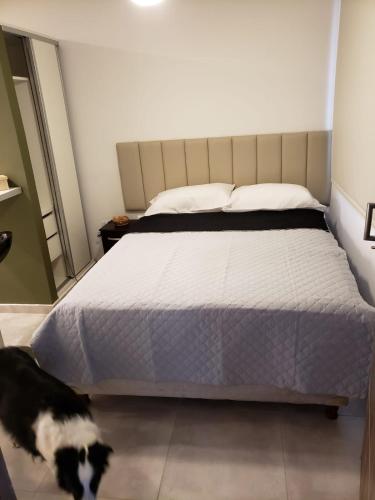 Ένα ή περισσότερα κρεβάτια σε δωμάτιο στο Ganesha Abasto Apartments