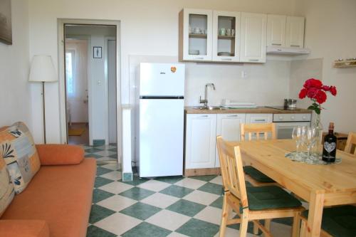 Kuchyň nebo kuchyňský kout v ubytování Apartman Laura
