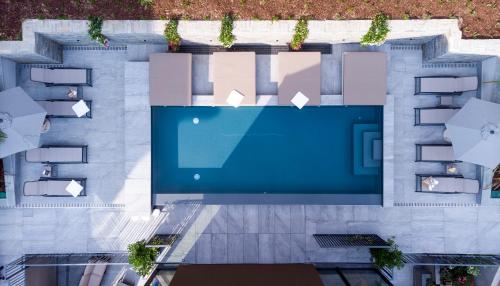 an overhead view of a swimming pool in a building at Le Stanze del Lago Villa Seta in Como
