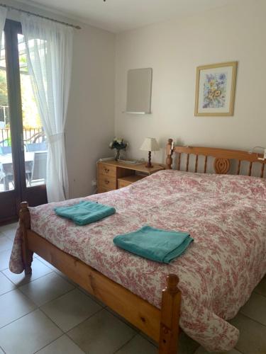 Ένα ή περισσότερα κρεβάτια σε δωμάτιο στο LANQUEDOC VILLA - L'AMANDIER