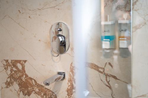 Koupelna v ubytování Hotel Kailash Kutee