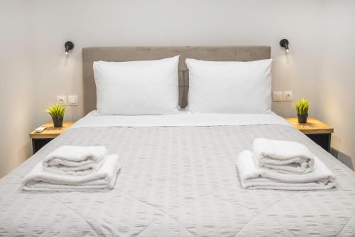 Katil atau katil-katil dalam bilik di Raise Averof Serviced Apartments