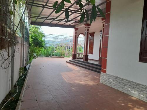 an empty hallway of a building with a porch at Homestay hải tiến 25 in Thanh Hóa
