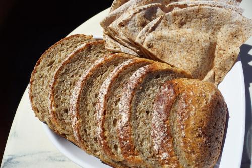 two slices of bread on a white plate at BRABO in Landskrona