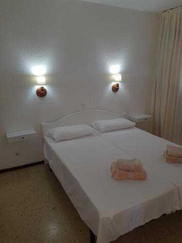 Lova arba lovos apgyvendinimo įstaigoje Apartamento en Playa del Inglés Los Mangos