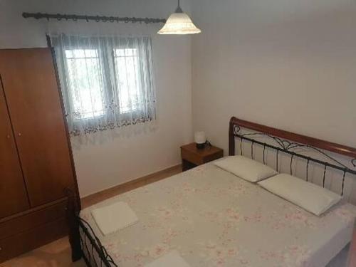 Postel nebo postele na pokoji v ubytování Porto Almira Beachfront Apartments