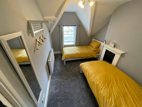 The Bala House tesisinde bir odada yatak veya yataklar