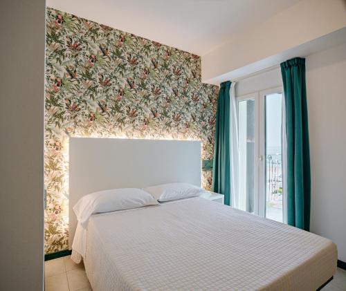 SoleMare Hotel e Residenceにあるベッド